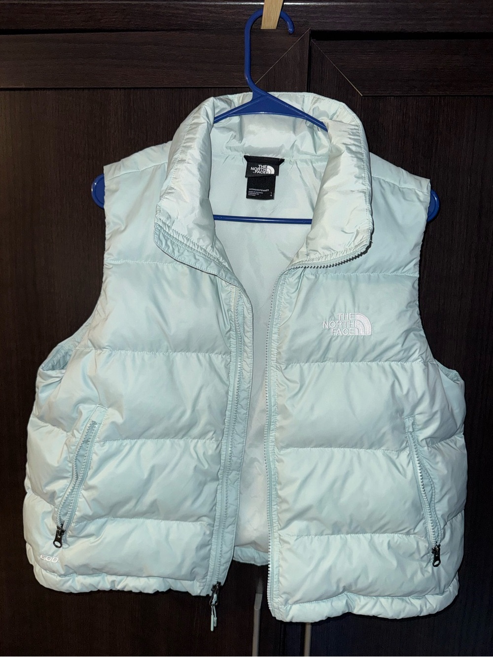 The North Face women’s light green puffer vest